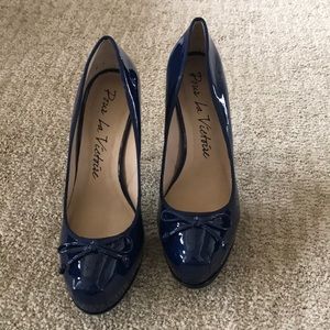 Navy patent heels
